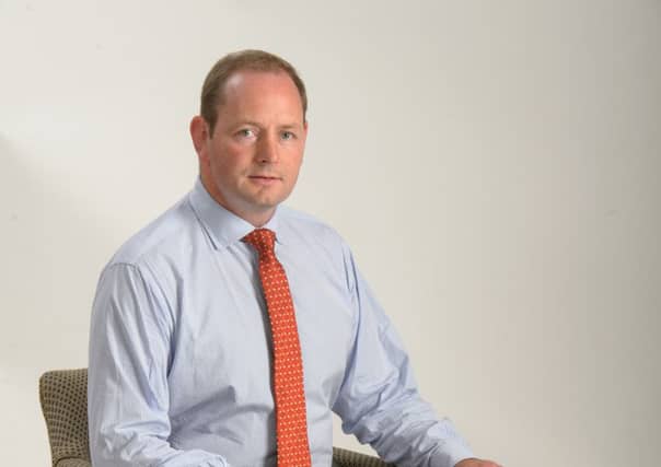 Robbie Brown is to step down from Wood Group at the end of the year