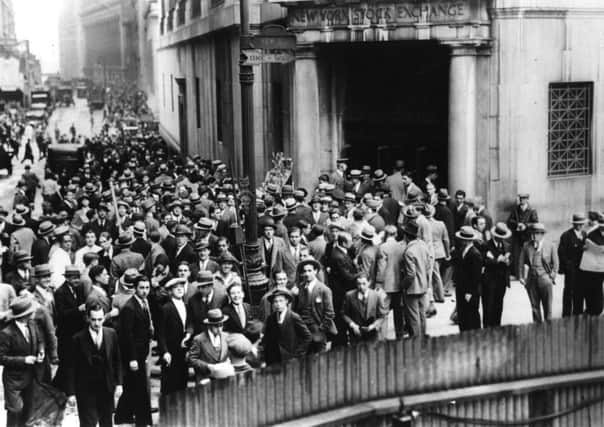 Crowds gather on Wall Street in New York following 'Black Tuesday', the stock market crash that occurred on this day in 1929 and which lead to the Great Depression. Picture: Getty