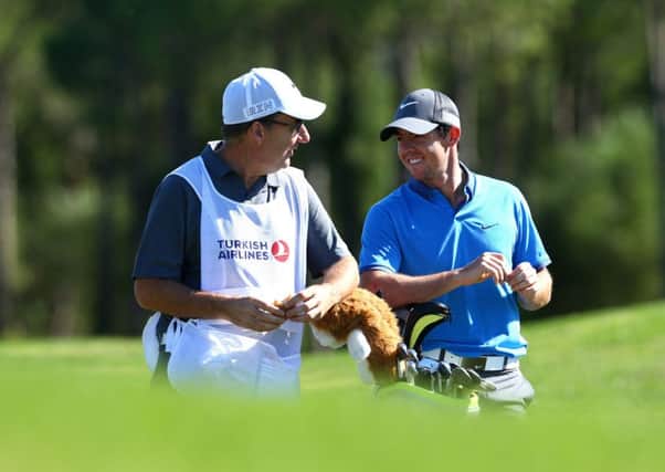 Rory McIlroyshares a joke with caddie JP Fitzgerald during practics for  the Turkish Airlines Open. Picture: Getty Images