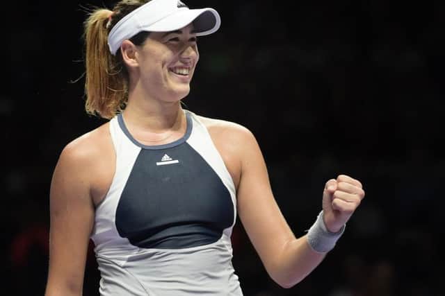 Garbine Muguruza of Spain celebrates as she defeats Angelique Kerber of Germany. Picture: AP