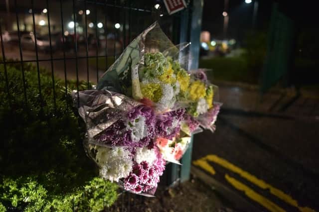 Floral tributes at Cults Academy in Aberdeen after a pupil was stabbed to death. Picture: Hemedia