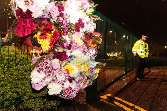 A floral tribute on the fence of Cults Academy last night. Picture: Ross Johnston/Newsline Media