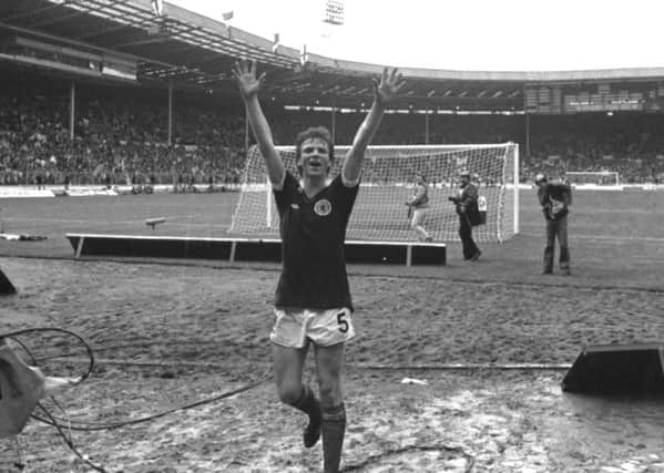 Alex McLeish salutes Scotland fans following a 1-0 win against England at Wembley Stadium in 1981. Picture: Hamish Campbell