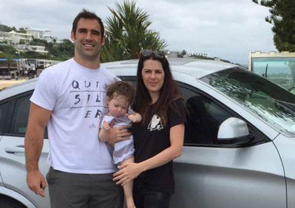 A clean-shaven Josh Strauss on holiday in South Africae with his family.