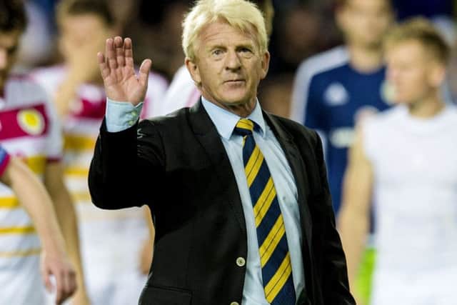 Scotland manager Gordon Strachan salutes the travelling fans at full-time in Scotland's 6-0 win over Gibraltar. Picture: SNS