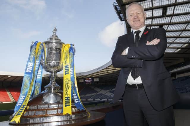 Alex McLeish says success is about 'holding trophies' rather than finishing in the last 16 of the Champions League.