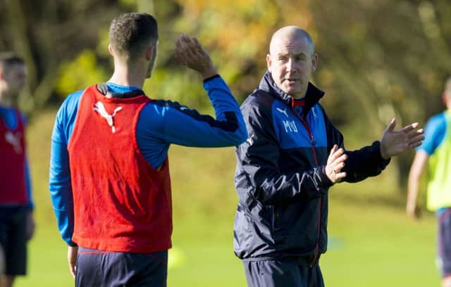 Mark Warburton directs training ahead of tomorrow's trip to Leith. Picture: SNS