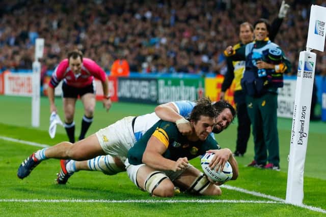 Eben Etzebeth squeezes over to score South Africa's second try of last night's hard-fought tussle. Picture: Getty