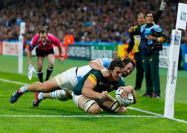 Eben Etzebeth squeezes over to score South Africa's second try of last night's hard-fought tussle. Picture: Getty