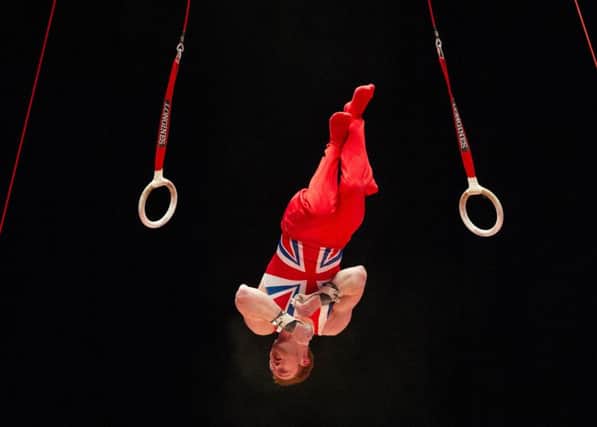 Team GB's Daniel Purvis earned a score of 14.466 following a good landing from the rings at the SSE Hydro last night. Picture: SNS