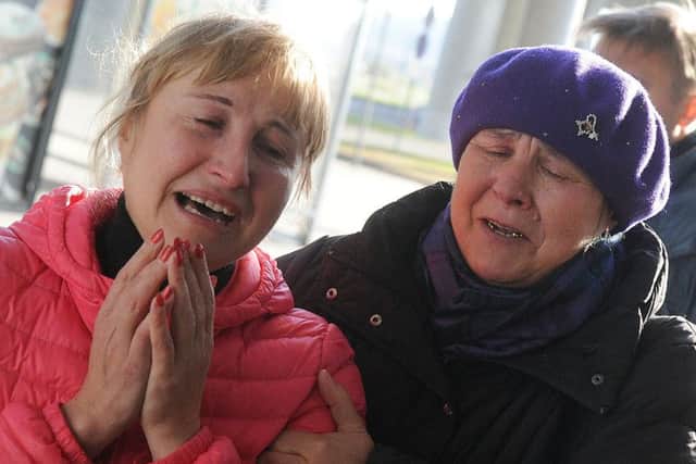 Relatives react at Pulkovo international airport outside Saint Petersburg. Picture: Getty