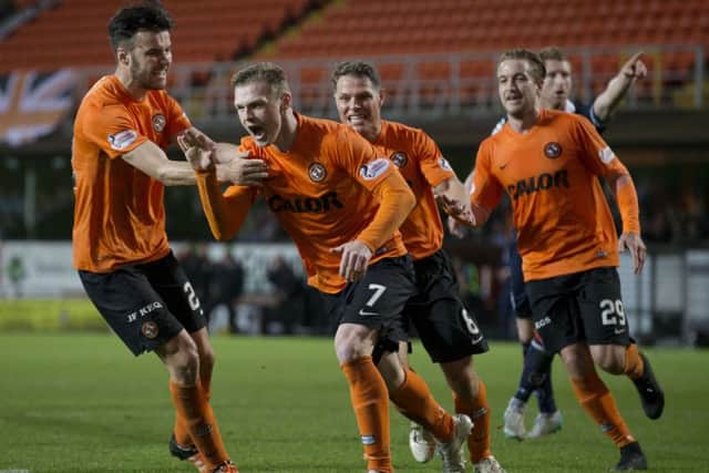 Billy Mckay celebrates after scoring his 81st-minute penalty. Picture: SNS