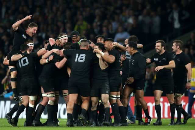 The triumphant New Zealand players celebrate at Twickenham after securing back-to-back World Cups. Picture: Getty