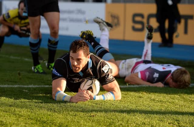 Sean Lamont slides in to score a try for Glasgow Warriors. Picture: SNS