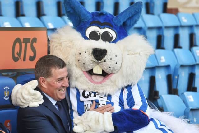 Mark McGhee meets Nutz, the playful Kilmarnock mascot. Picture: SNS