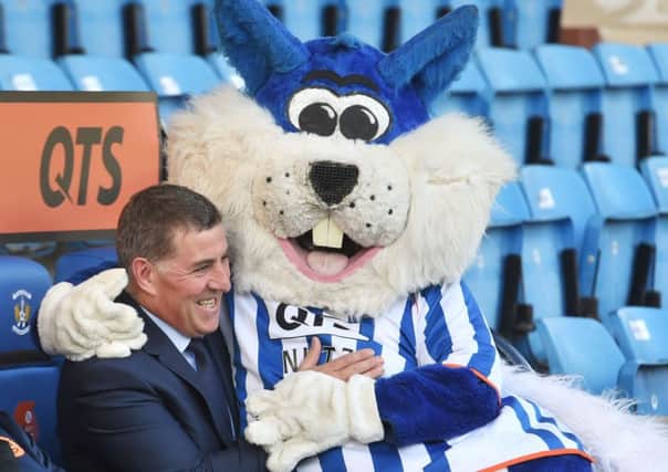 Mark McGhee meets Nutz, the playful Kilmarnock mascot. Picture: SNS
