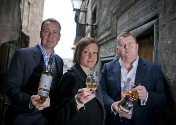 Edinburgh Whisky's Gordon Watt, left, with Jill Jardine of Clydesdale and co-founder Gregor Mathieson. Picture: Chris Watt