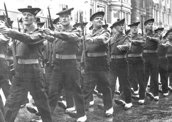Soldiers from the King's Own Scottish Borderers regiment (KOSB) march along Princes Street in Edinburgh in April 1961. Picture: TSPL