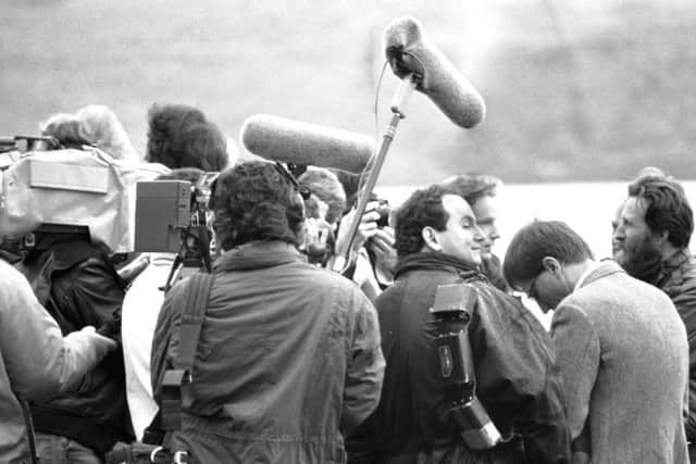 Gentlemen of the Press at 'Operation Deep Scan', where 24 boats equipped with sonar spread across Loch Ness in an attempt to find the Loch Ness Monster in October 1987.