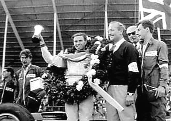 Jim Clark after winning the 1963 Netherlands Grand Prix en route to his first F1 Drivers' Championship World Title. Photo: Gahetna