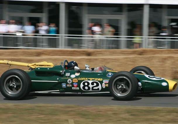 Jim Clark's Indianapolis 500-winning Lotus 38 driven by contemporary Sir Jackie Stewart. Photo: Sporti