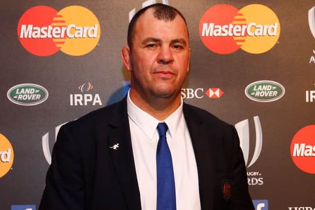 Michael Cheika poses after receiving the World Rugby Coach of the Year award. Picture: Getty Images