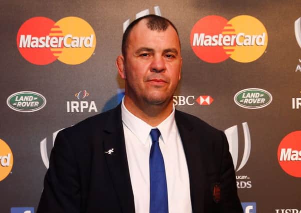 Michael Cheika poses after receiving the World Rugby Coach of the Year award. Picture: Getty Images