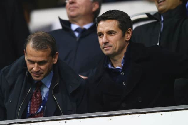New manager Remi Garde (right), who has signed a deal until 2019, at White Hart Lane last night. Picture: Getty Images