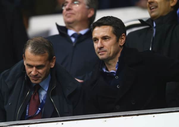 New manager Remi Garde (right), who has signed a deal until 2019, at White Hart Lane last night. Picture: Getty Images