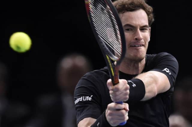Andy Murray delivers a two-handed backhand during his comprehensive victory over Croatia's Borna Coric in Paris yesterday. Picture: AFP/Getty