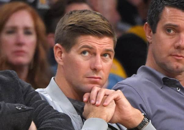 Steven Gerrard:  Can train at Liverpool while he is back in England. Picture: AP