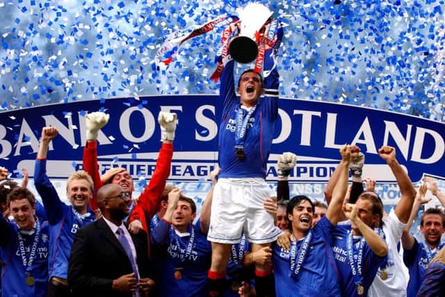 Barry Ferguson lifts the SPL trophy as Rangers captain in 2003, one of four titles won during the period when the Ibrox club were using EBTs. Picture: Phil Wilkinson
