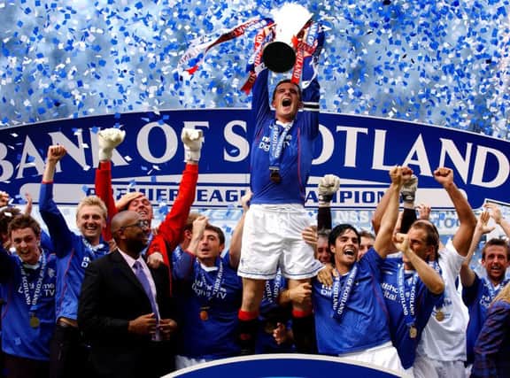 Barry Ferguson lifts the SPL trophy as Rangers captain in 2003, one of four titles won during the period when the Ibrox club were using EBTs. Picture: Phil Wilkinson