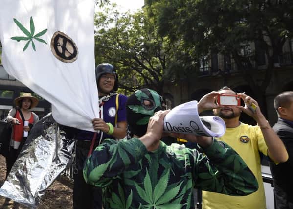 Protesters attend a rally supporting the legalisation of marijuana in front of the Supreme Court of Justice in Mexico City. Picture: AFP/Getty Images