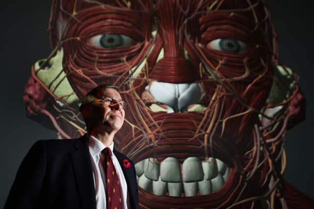 Mr Ian Ritchie, president of the Royal College of Surgeons of Edinburgh, in front of the 3D Definitive Human at Glasgow School of Art's Digital Design Studio. Picture: John Devlin