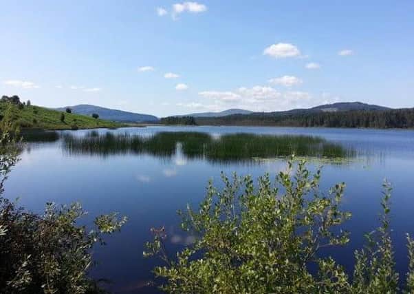 Loch Stroan in Galloway. The surname derives from the town name