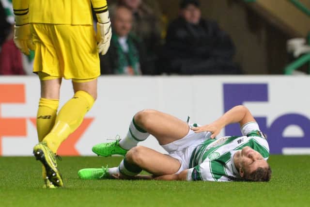 Jozo Simunovic lasted only four minutes before succumbing to an ankle injury and he was sorely missed by the Celtic defence. Picture: SNS Group