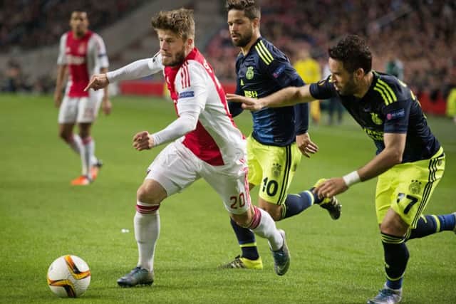 Midfielder Lasse Schone (left) vies with Fenerbahce's Turkish defender Gokhan Gonul (right). Picture: AFP/Getty Images
