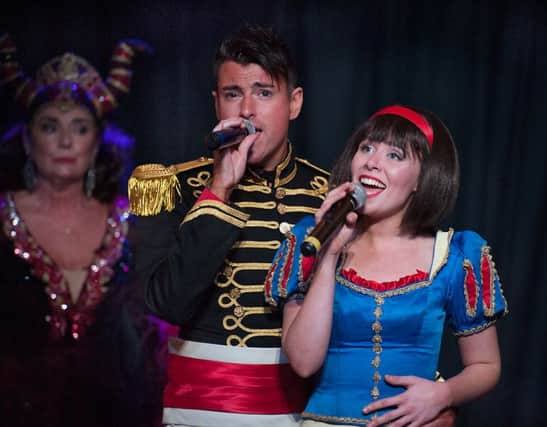 Jenny Hayley-Douglas and Allan Jay sing to promote the Glasgow King's pantomime Snow White. Singing can be good for your heart, according to experts