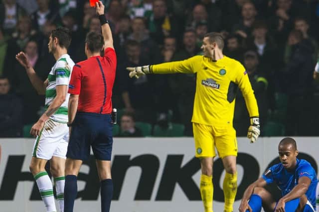 Celtic's Nir Bitton is shown a red card by referee Slavko Vincic. Picture: Bill Murray/SNS