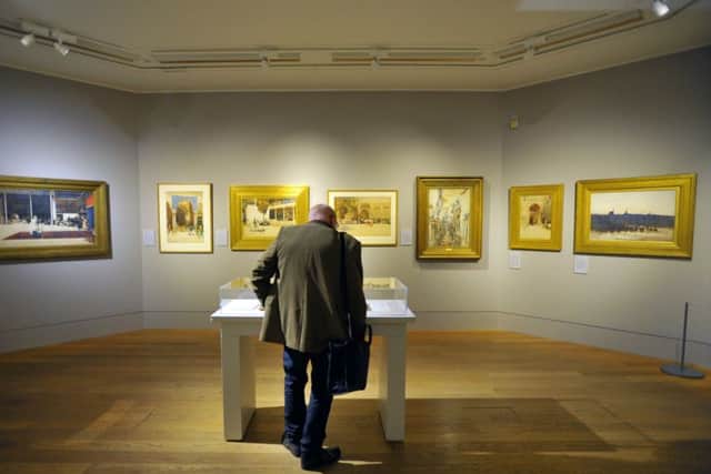 The Scottish National Gallery on Princes Street saw visitors wandering its exhibition last year. Picture: Jane Barlow