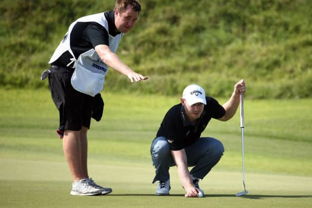 Scott Henry lines up a putt on the 15th green during the third round of the NBO  Challenge Tour Grand Final yesterday. Picture: Getty
