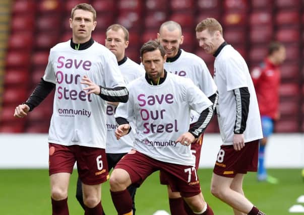 Motherwell's Stephen McManus (left) and Scott McDonald during the warm-up. Picture: SNS Group