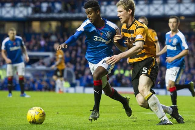 Rangers' Gedion Zelalem brushes off Colin Hamilton (right). Picture: SNS Group