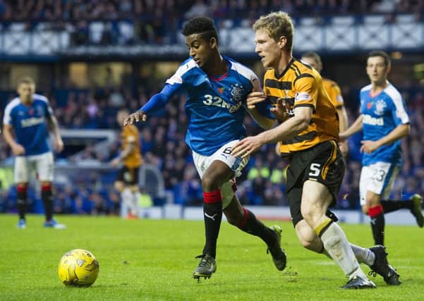 Rangers' Gedion Zelalem brushes off Colin Hamilton (right). Picture: SNS Group