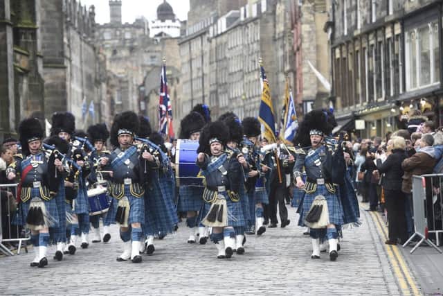 A  Remembrance Day parade on Edinburgh's Royal Mile. Picture: Greg Macvean