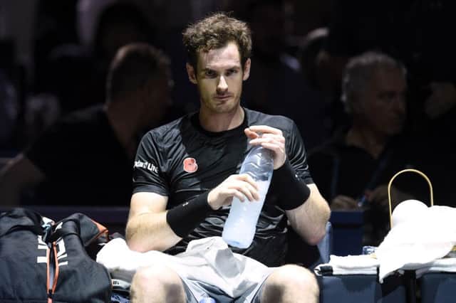 Andy Murray keeps hydrated in his BNP Paribas Masters final clash with Novak Djokovic but the Scot eventually had to settle for second prize.  Picture: Getty