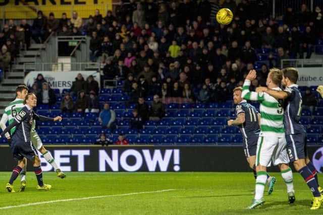 Celtic's Nir Bitton  watches on as his effort finds the back of the net. Picture: SNS