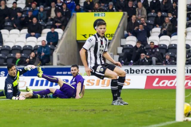 Hibs striker James Keatings, centre, watches his 37th-minute strike find the net. Picture: SNS