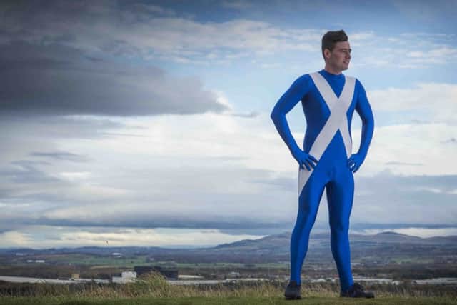 Josh Quigley is raising awareness of mental health issues by travelling around the world visiting charities and other countries dressed in a saltire morphsuit and a kilt.  Picture: Alex Hewit